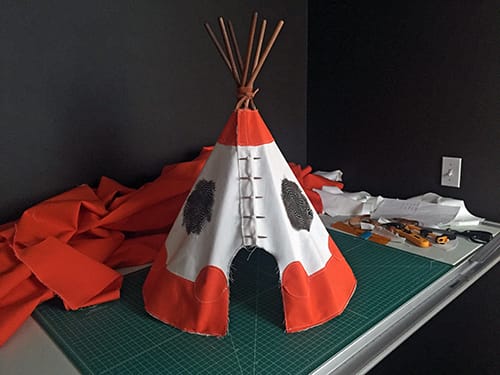 The completed tipi sitting on a table